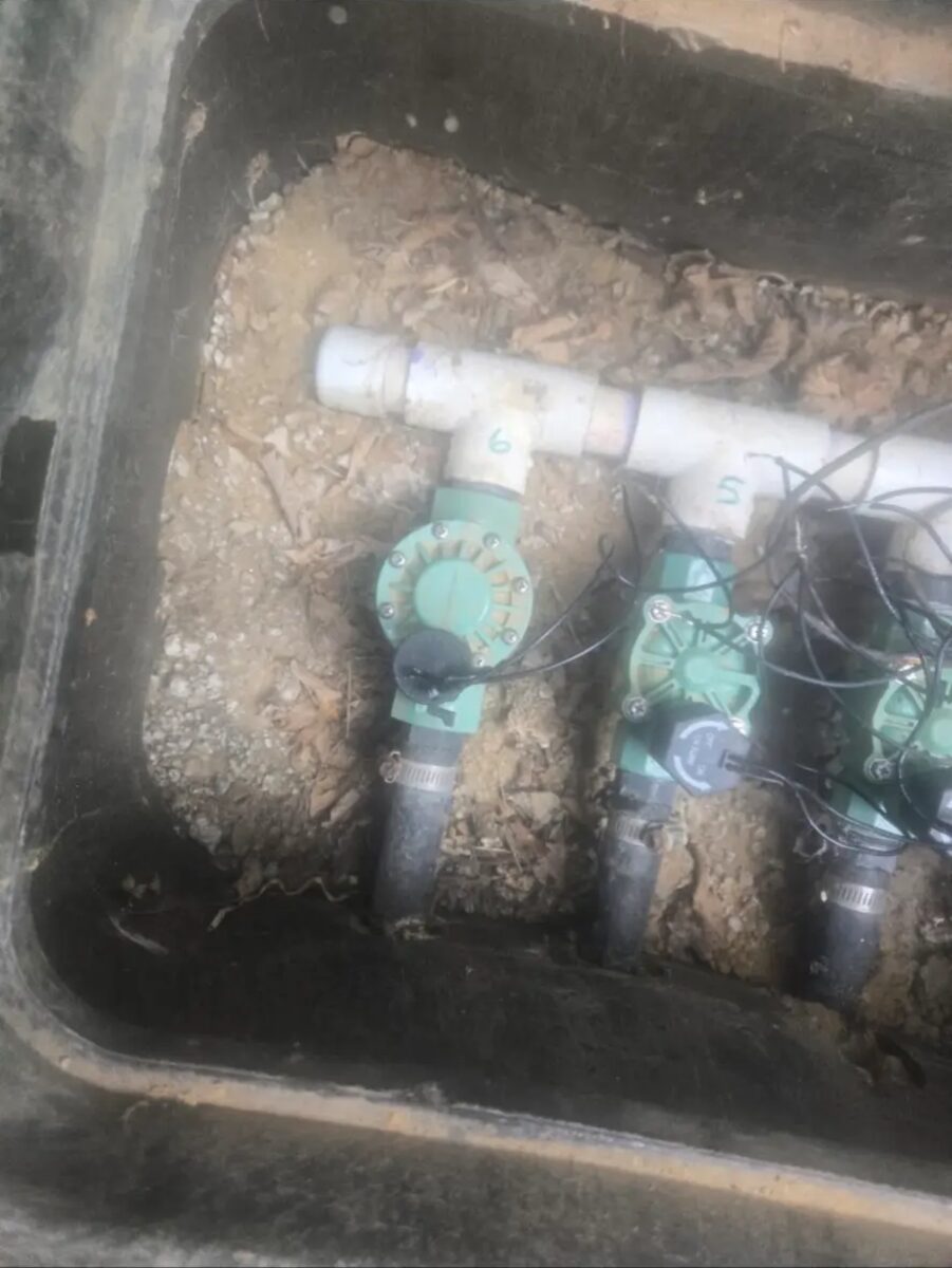 Zone valves numbered and serviced inside the box so future repairs are simple.