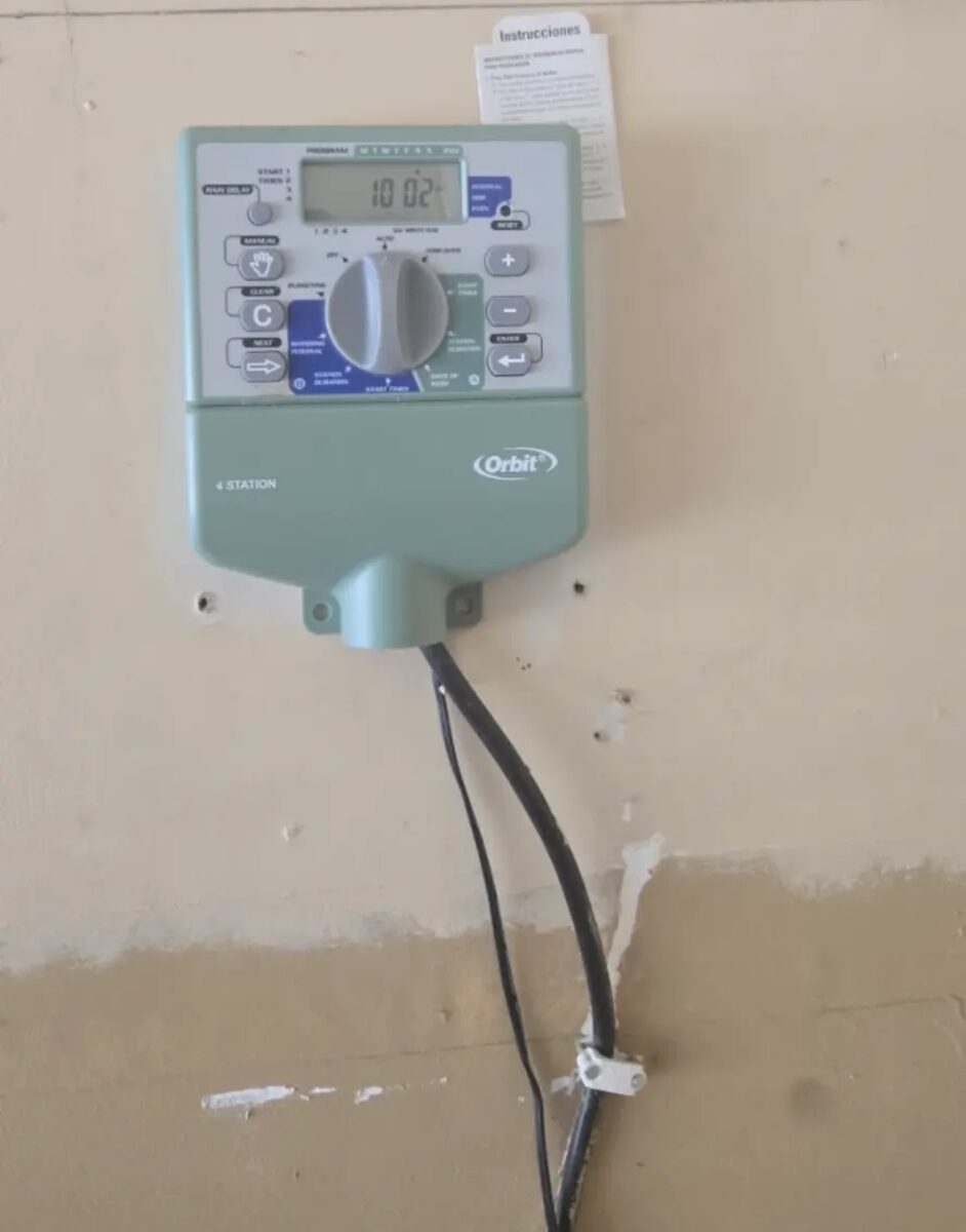 Four-station controller mounted, powered and set on a seasonal watering schedule.