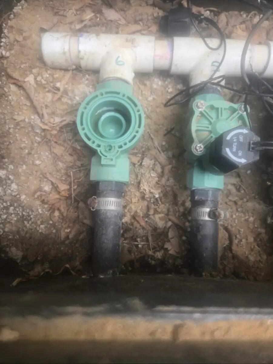 Two replacement valves set on the manifold with clamped risers and clean tee work.