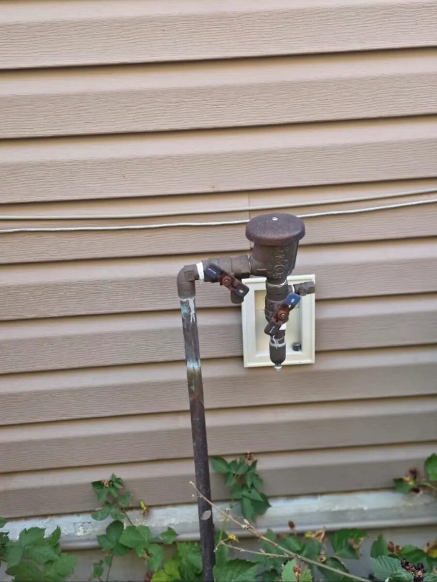 Older backflow assembly evaluated for rebuild or replacement.